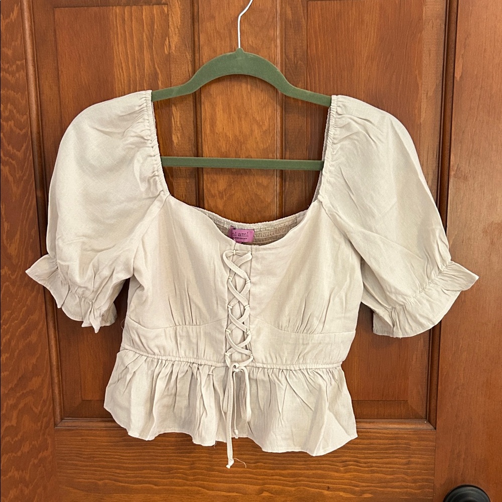 Francesca’s NWT Cream Lace-Up peplum crop Top